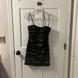 La femme size 8 black and nude sheer beaded cocktail dress. Dress is strapless*